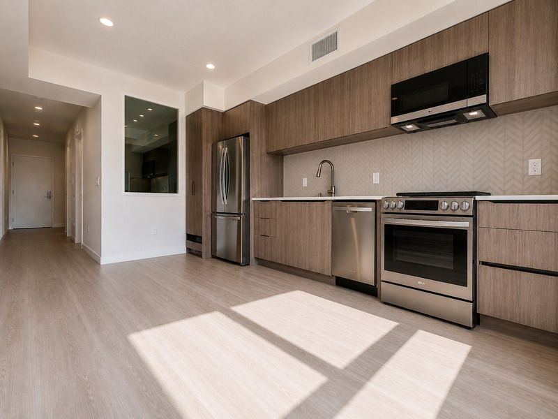 Kitchen with full-size stainless appliances and interior pass-through window